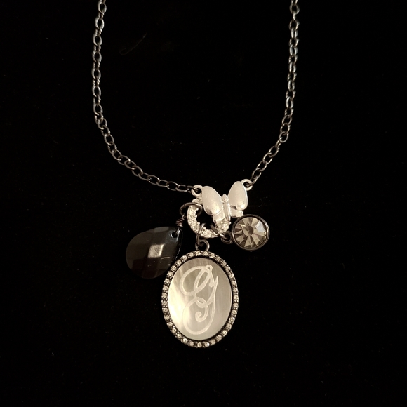 Guess Black and Silver Butterfly Mother of Pearl Necklace - Picture 2 of 2